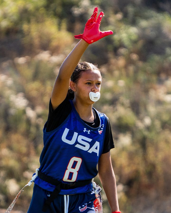 Isla Collins signaling to the sideline in her USA Football 17U national team uniform